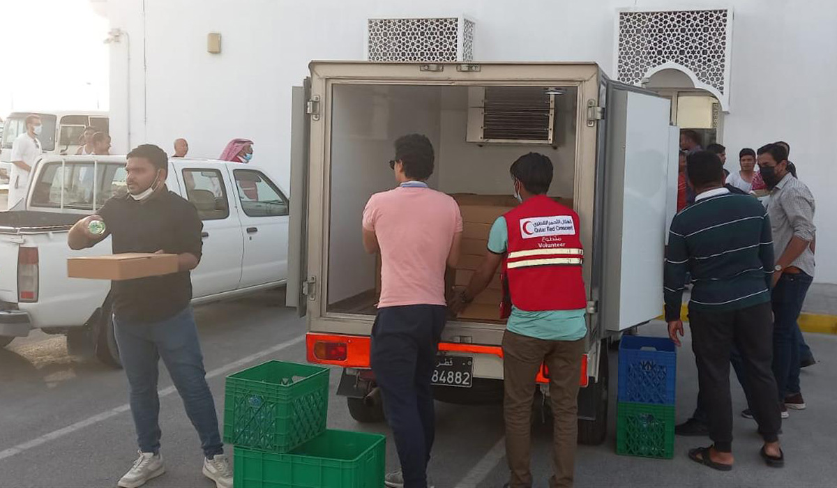 QRCS, KPMG Qatar distribute Ramadan Iftar meals to expatriate workers